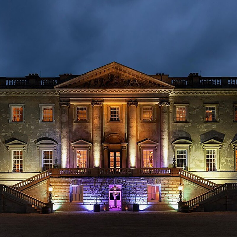 A corporate event at hosted at Kirtlington Park, colourfully illuminated at night