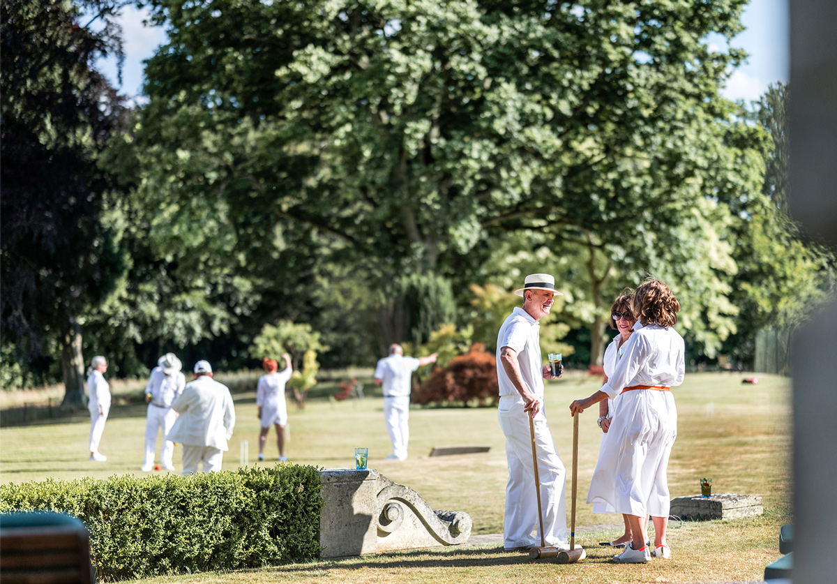 Playing croquet on the lawn